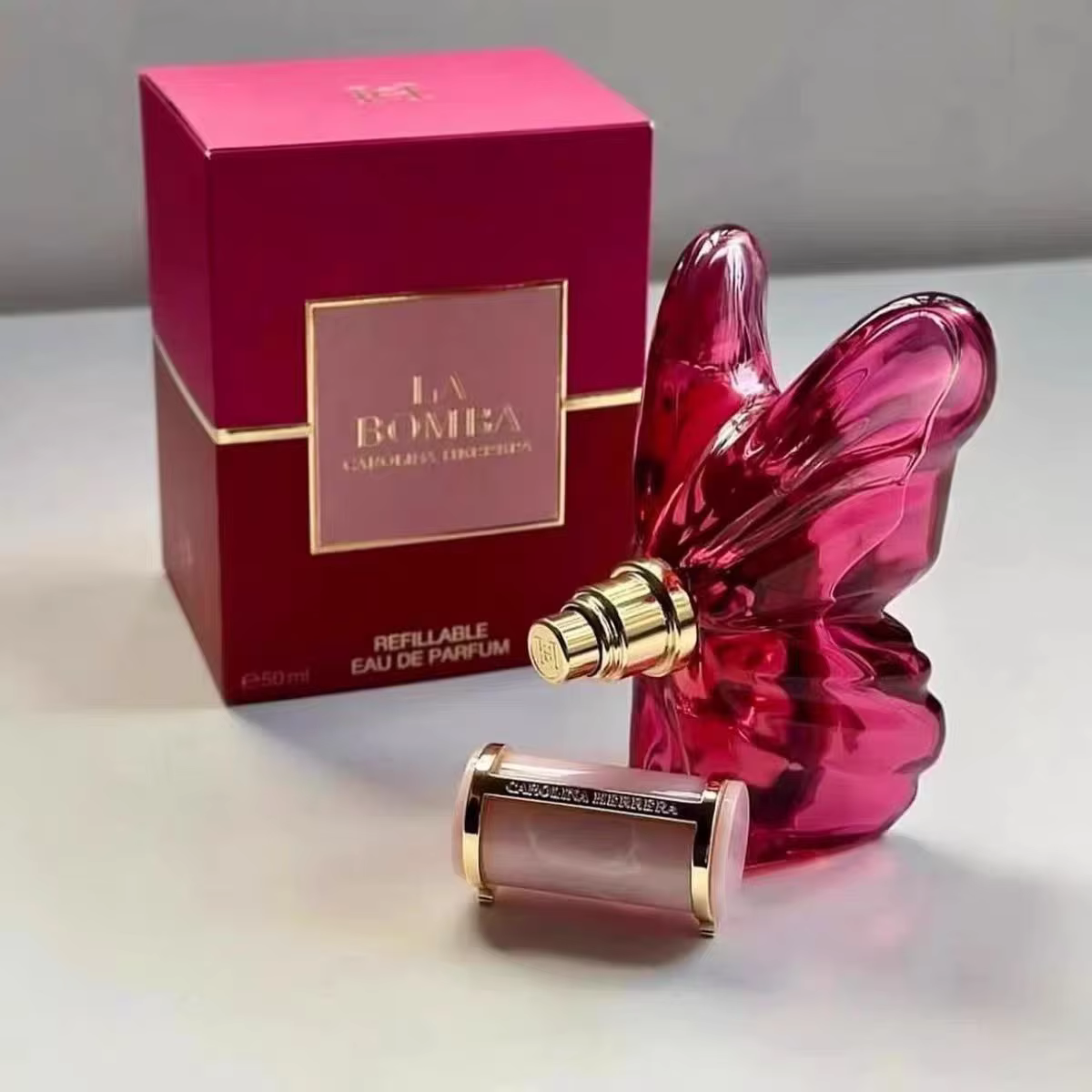 LA Bom. b.A 2.7oz female perfume, fresh flower and fruit fragrance, dragon fruit integration, unique butterfly design